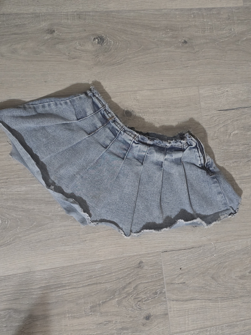 refuge Washed Light Blue Pleated Denim Mini Skirt with Frayed Waist